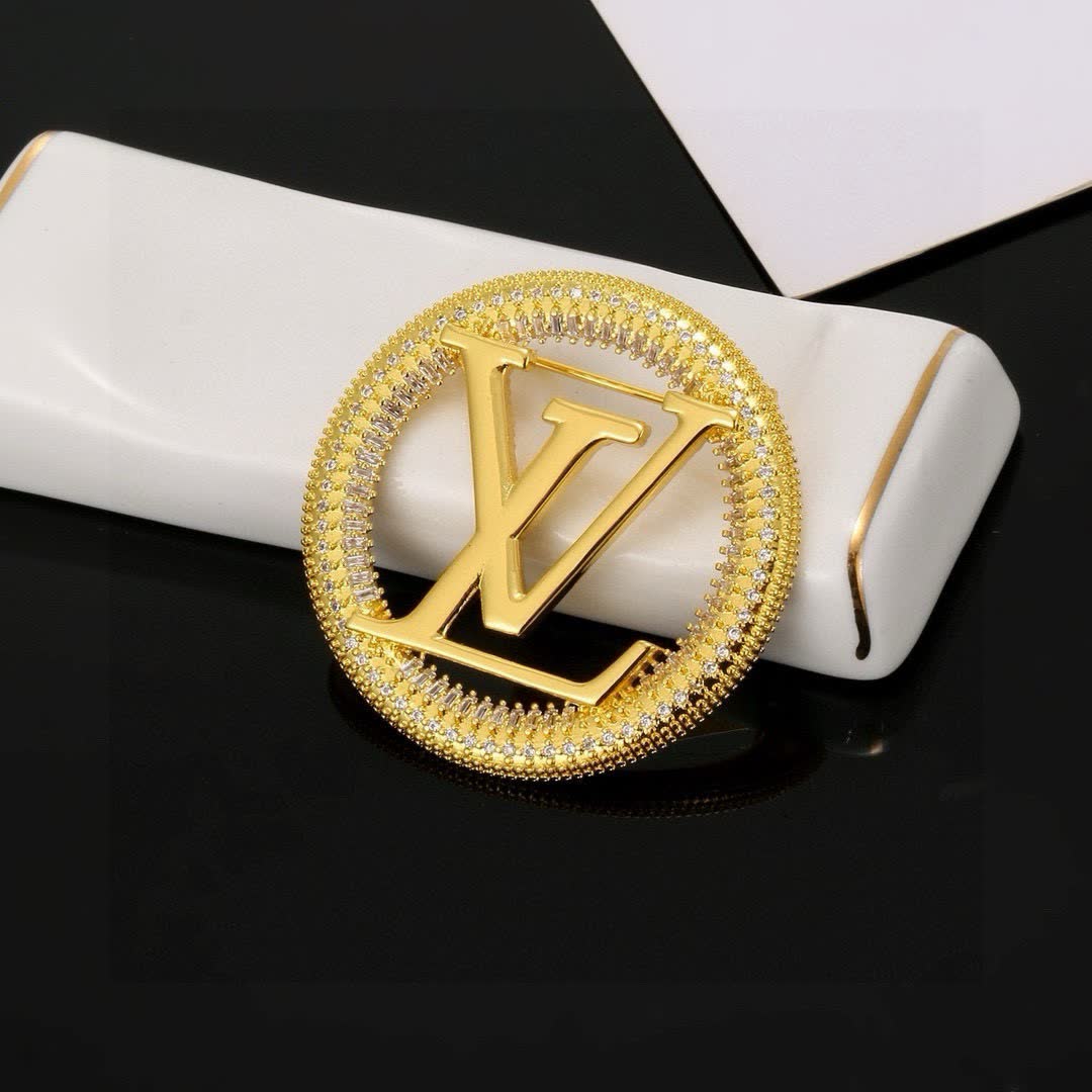 Louis Vuitton Gold Tone Logo Brooch with Rhinestones